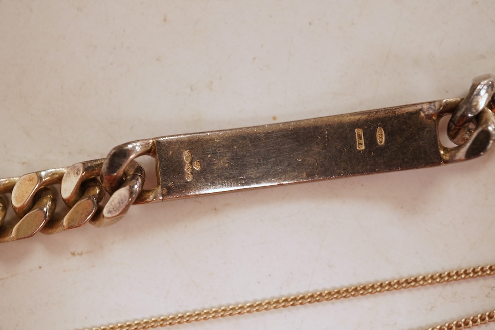 A silver necklace and bracelet, comprising: a silver ingot pendant necklace, pendant length 5.2cm including bail; and a silver curb link ID bracelet, length 20cm, each with British hallmarks, combined gross weight 82 gra